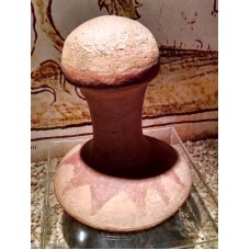 Phallic ceramic artifact, solar disc, sun rays